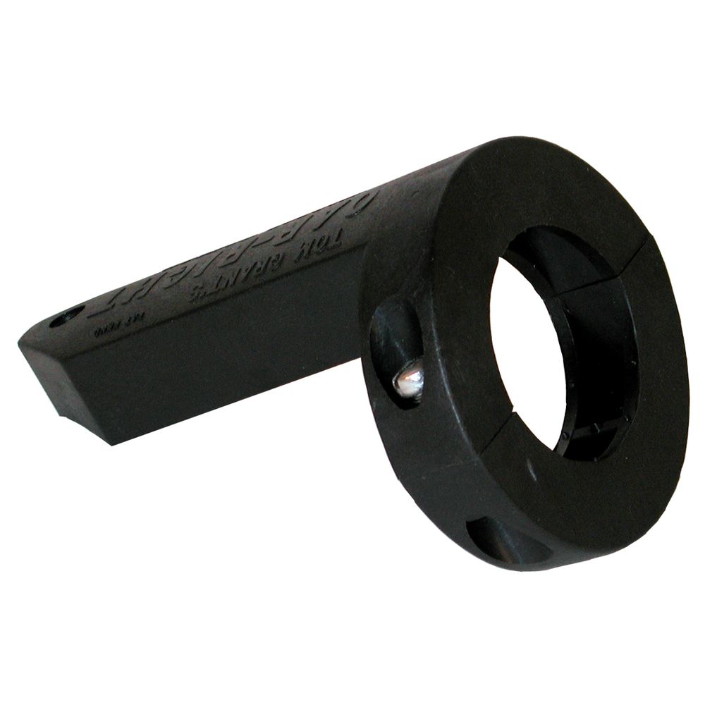 The Carlisle Oar Right is a black tool with a handle and circular opening, resembling the precision of a molded oar sleeve, used for adjusting tension on a garage door spring.