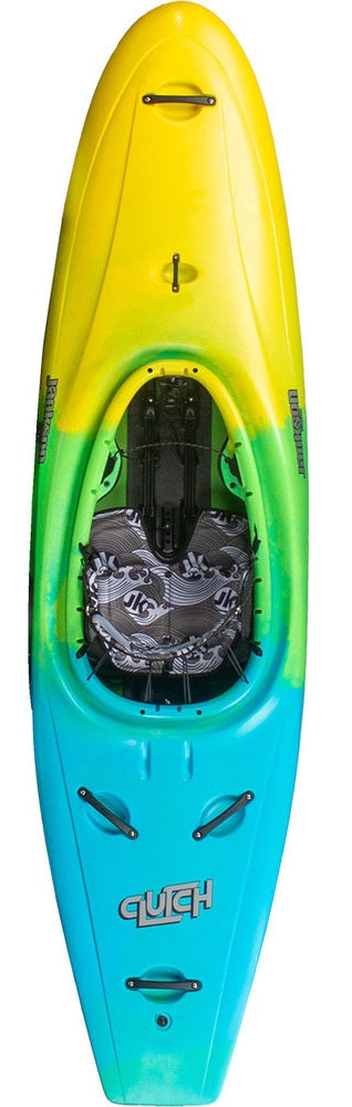 A brightly colored kayak in yellow, green, and blue hues with a "Jackson Kayak" logo on both sides and "Guch" written on the nose. This Clutch kayak features carry handles, a seating area, and a closed deck for an adventurous ride.