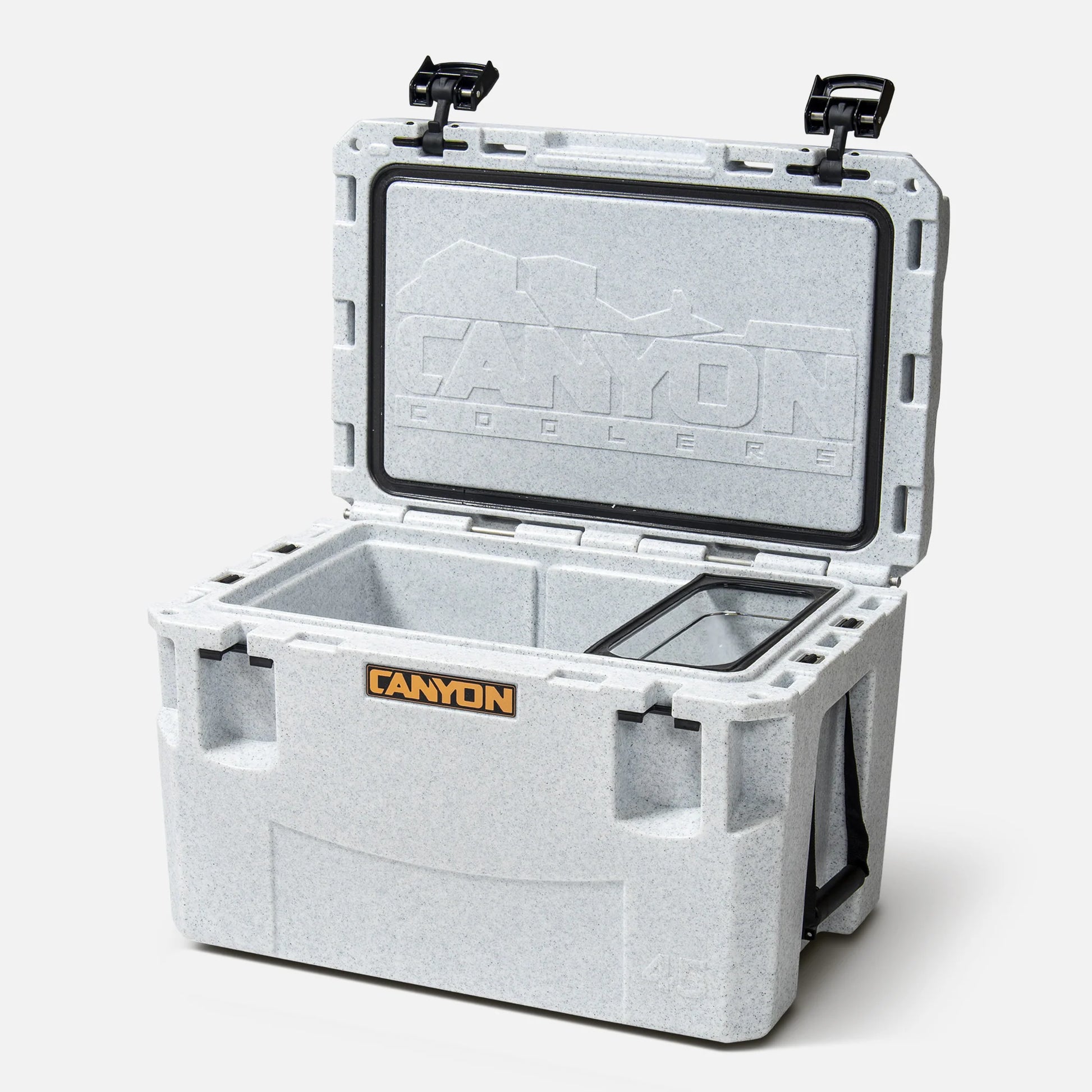 Open grey Canyon Coolers with the lid up, showcasing a visible logo and durable polycarbonate design, featuring heavy-duty latches and handles. Perfect for outdoor adventures or securely storing Catering Pans.