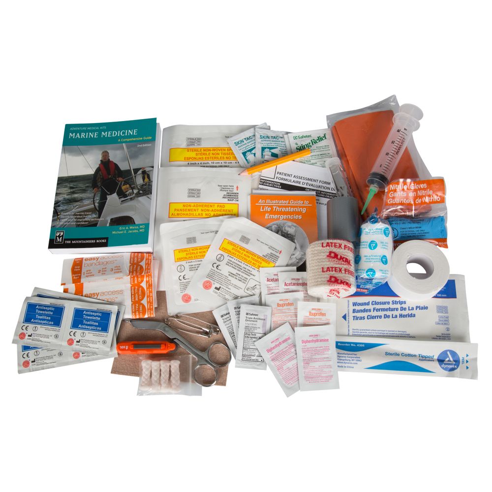 The NRS Paddler Medical Kit, stored in a waterproof dry bag, includes emergency supplies such as bandages, antiseptic wipes, tape, gloves, a syringe, and a medical guidebook.