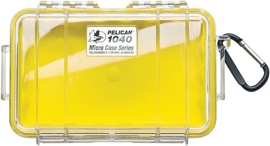 A yellow Pelican Micro Cases with a carabiner.