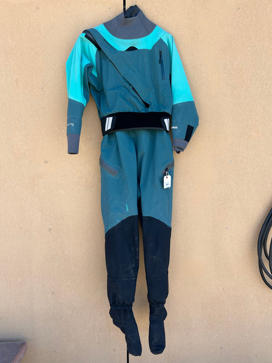 A teal and black Demo Drysuit - NRS Axiom W's LG from our rental fleet is hanging on a wall. The suit, featuring multiple pockets and built-in booties, is in good condition.