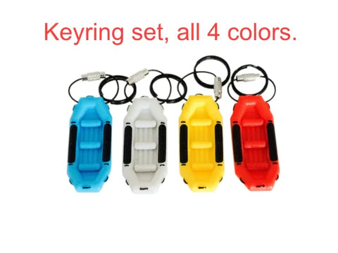 A set of four Raft Key Chains from Kingdom Outdoor Products in blue, white, yellow, and red, with the text "Raft Key Chain Set - All 4 Colors" above them.