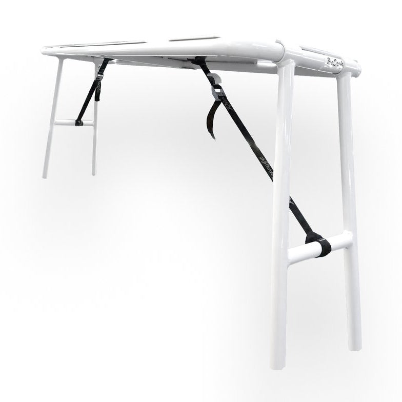 Against a plain white backdrop, the Rio Craft Aluminum Camp Table is shown as a sleek, white folding table with black straps securing its legs. This lightweight camping table combines functionality and style, making it ideal for any outdoor adventure.