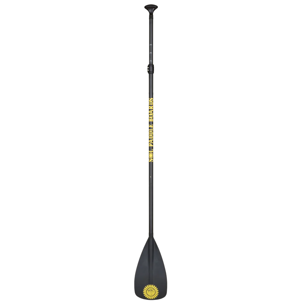 SOL's Carbon Blaster 3-Piece Travel SUP Paddle, with an adjustable handle, boasts a black carbon design featuring the "Grand Teton Park" logo and a yellow sun emblem near the blade. This paddle ensures smooth strokes for your adventures on the water.