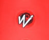 A white "W" logo with black shadowing set against a bright red background, evoking the sleek design of the Waka OG kayak.