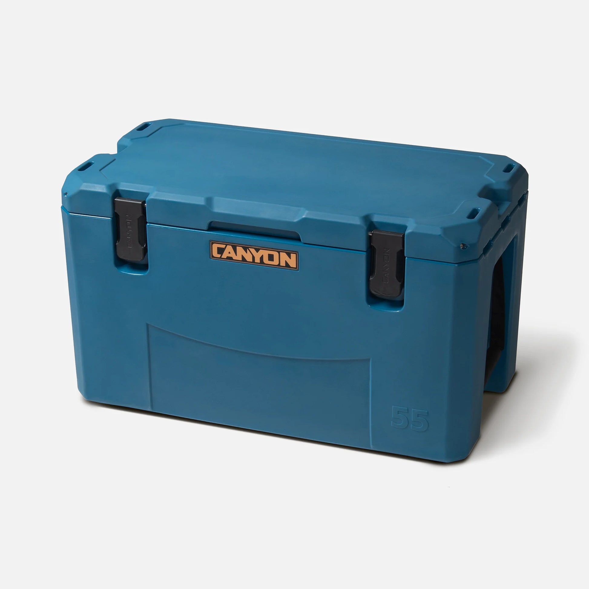 Introducing the Outfitter V2 Series Cooler by Canyon Coolers: a blue rectangular design with "Canyon" label, dual black clasps, and 55-capacity. Made from premium sun-resistant polymer, it boasts an innovative dual-action drain for easy maintenance.