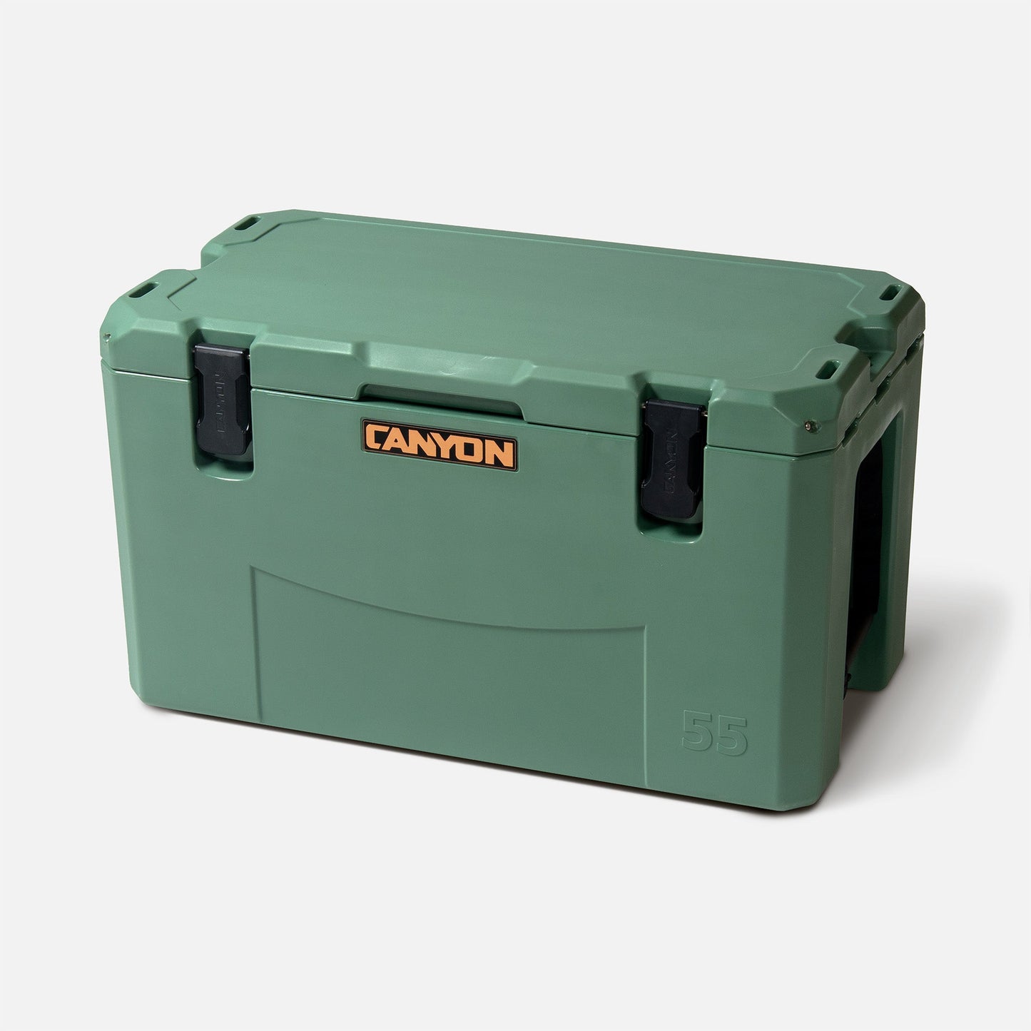 The 55-quart green Outfitter V2 Cooler by Canyon Coolers features black latches and a tan logo, made from premium sun-resistant polymer. Its dual-action drain ensures easy emptying after adventures.