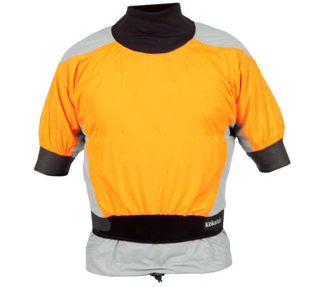 The Kokatat Blast Semi Dry Shorty is a bright orange and gray short-sleeved dry top with black trim, expertly designed for kayaking. It features waterproof fabric and a snug neoprene waistband, providing comfort with its breathable material while ensuring a secure fit around the neck and waist.