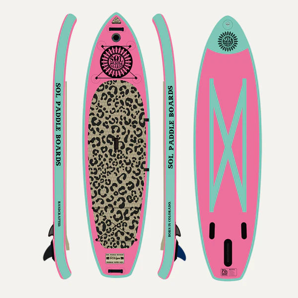 The SOLlynx Galaxy Inflatable Paddle Board, by SOL Paddle Boards, features a bright pink and teal design with a leopard print grip pad. Ideal for flat water paddling, it showcases the brand's sun logo and is displayed from three angles.