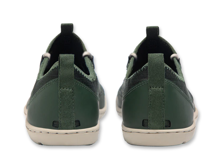 These Loyak AC men's casual shoes by Astral, seen from the back, are dark green with stitched details and durable white soles made of sticky G-Rubber outsoles for superior grip.