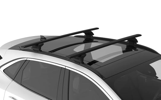 Roof rack bars, including yakima SightLine Towers, mounted on a car's roof for transporting cargo via flush-mount factory side rails.