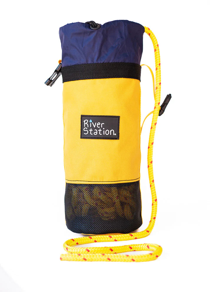 Yellow and blue B.O.A.T. - Classic Rescue Throw Bag - 70ft with floating rescue rope used for water rescue operations, isolated on a white background by River Station Gear.